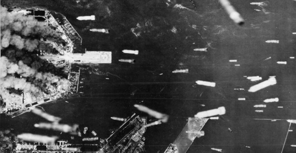 Incendiary bombs drop over Osaka, July 1945