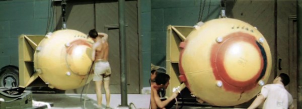 The following images are screens taken from footage taken of the Fat Man preparations on Tinian, courtesy of Los Alamos National Laboratory. Above, preparing the final weapon, sealing the ballistic case joints with red Pliobond and blue Glyptol (plastic film). The different colors made it clear that they were properly applied and overlapped.