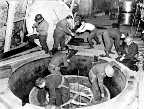 Allied troops disassembling the German experimental research reactor at Haigerloch, as part of the Alsos mission. Source: Wikipedia.