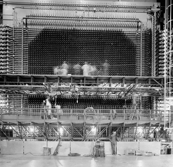 A photograph of an early Hanford reactor that used to be in the Hanford DDRS — one of my favorites, both because of its impressive communication of activity and scale.