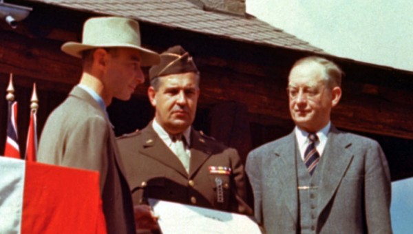 A rare color photograph of Oppenheimer from October 1945, with General Groves and University of California President Robert Sproul, at the Army-Navy "E" Award ceremony. Source.