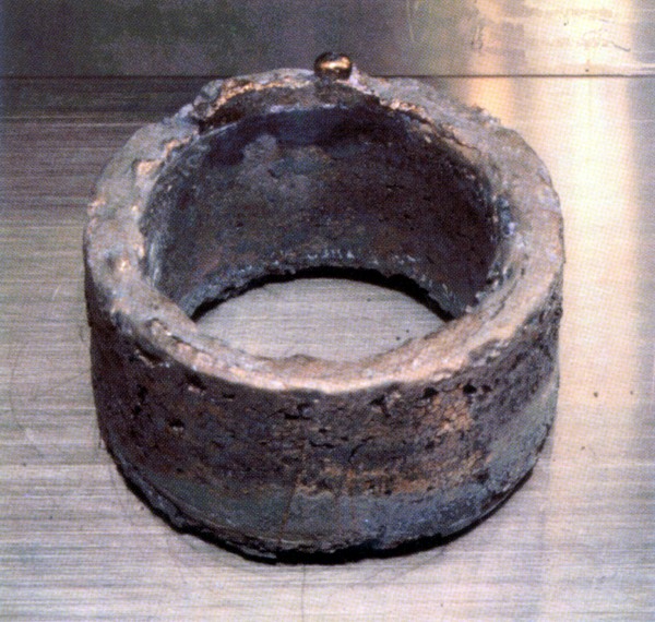 A 5.3 kg ring of 99.96% pure plutonium-239. Under some conditions, this is enough to produce a significant explosive output. In its current form — unreflected, at normal density, in a ring-shape that prevents any neutrons from finding too many atoms to fission with — it is relatively innocuous. 
