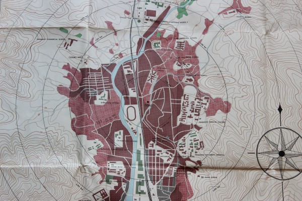 Detail from a damage map of Nagasaki, produced by the United States Strategic Bombing Survey, 1946. I have the original of this in my possession. I find this particular piece of the map quite valuable to examine up close — one gets a sense of the nature of the area around "Ground Zero" very acutely when examining it. There were war plants to the north and south of the detonation point, but mostly the labeled structures are explicitly, painfully civilian (schools, hospitals, prisons). Click to enlarge.