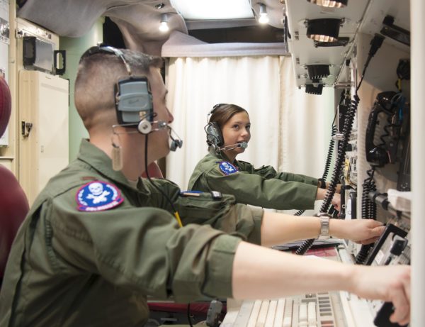 "1st Lt. Pamela Blanco-Coca, 319th Missile Squadron missile combat crew commander, and her deputy commander, 2nd Lt. John Anderson, simulate key turns of the Minuteman III Weapon System Feb. 9, 2016, in a launch control center in the F.E. Warren Air Force Base, Wyo., missile complex. When directed by the U.S. President a properly conducted key turn sends a 'launch vote' to any number of Minuteman III ICBMs in a missileer's squadron, with two different launch votes enabling a launch. (U.S. Air Force photo by Senior Airman Jason Wiese)"